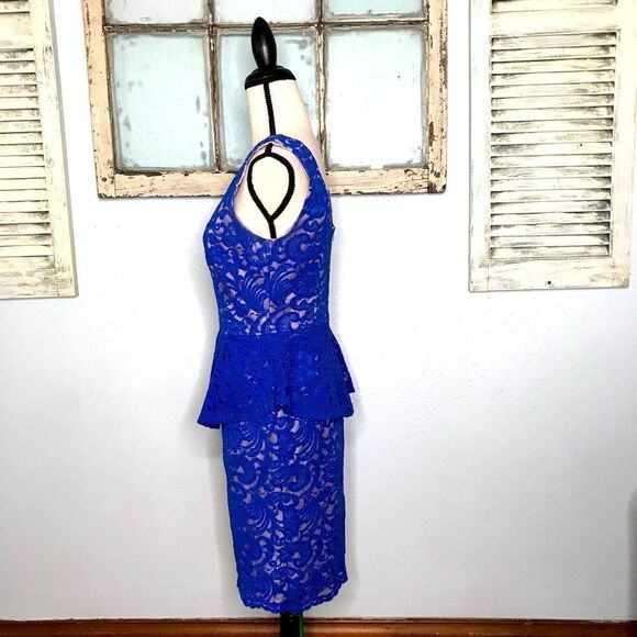 Beautiful Lace Peplum Dress by Explosion - Picture 7 of 13